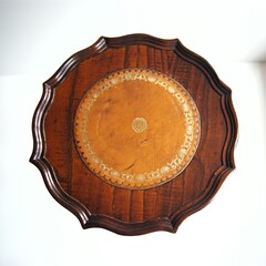 Top of antique table top with brown leather.