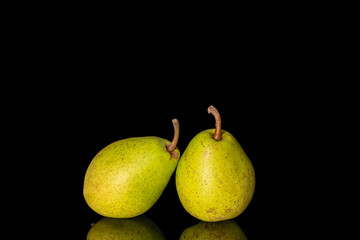 fresh pears isolated on black glass