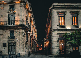 Historic Colonial Street at Night with Warm Lighting
