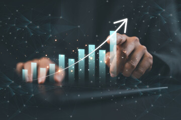 
Businesswoman use laptop ,analytics and financial and bank technology concept, chart from computer laptop,Business growth concept 