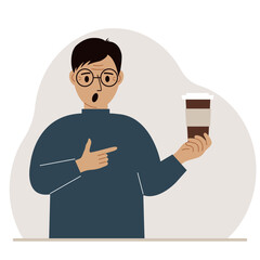 A man holds a paper cup with coffee.