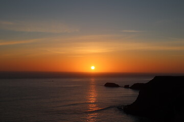 Coastal sunset over the ocean