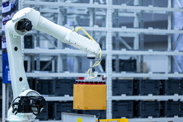 Robotic arm handling boxes on pallets in automated warehouse, Logistics warehouse automation robotics, Robotic arm automated factory packing system efficient industrial box handling and logistics