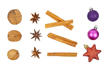 set of christmas decorations: walnut, anise star, cinnamon and christmas balls in red and purple isolated on white or transparent png