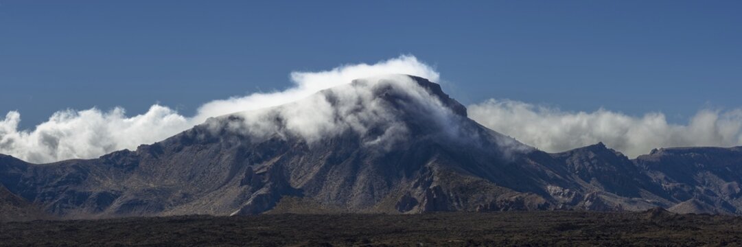 The summit of Monta&ntilde;a Guajara, also: Alto de Guajara, 2715m, crater walls, Caldera de las Ca&ntilde;adas, a huge volcanic cauldron, Teide National Park, Parque Nacional del Teide, at sunrise, Tenerife, Canary Islands, Spain