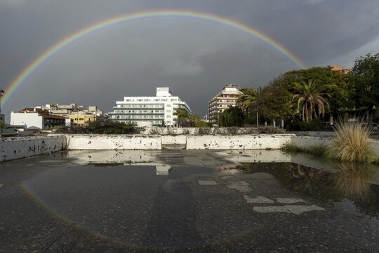 Rainbow over the Plaza de la Derrhumbada, former bus station, closed since 2009 due to dilapidation, Puerto de la Cruz, Tenerife, Canary Islands, Spain