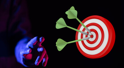 Hand reaching toward bullseye with darts. Concept of achievement, success, and strategy. Perfect...
