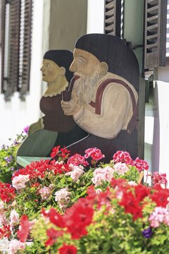 Traditional wooden bench, arts and crafts, flowers, summer, Garmisch-Partenkirchen, Bavaria, Germany