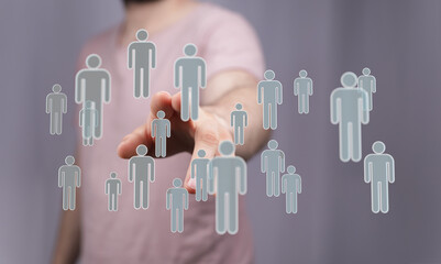 Hand reaching towards a network of connected people, symbolizing community, networking, and social...