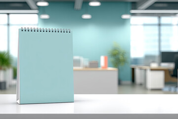 Blank spiral notebook on a clean desk in a modern office environment with natural light