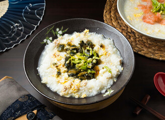 century egg and Lean Pork congee or porridge. A culinary delight that blends tradition and taste, perfect for a comforting, nourishing meal anytime.