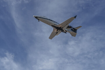 Corporate aircraft flying over