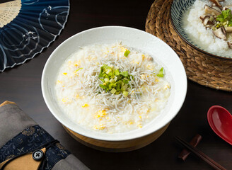 Comforting bowl of Japanese rice porridge.Perfect for a quick lunch or cozy dinner. This dish brings warmth to any setting with its savory taste