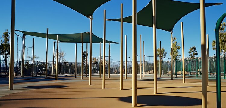 Neutral-hued open-air playground with vertical balance poles and flat shading