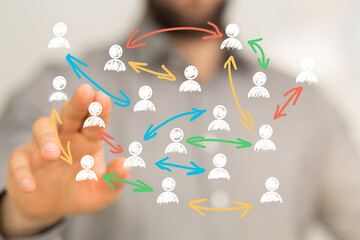 Image of hand interacting with a network of people, symbolizing teamwork, collaboration, and connection.