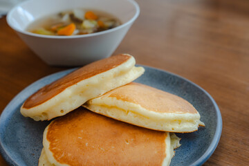 Fluffy pancakes and vegetable soup for breakfast
