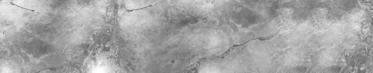 Gray marble stone surface with natural cracks and detailed mineral texture for modern architectural background