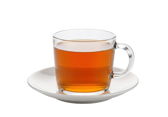 Glass cup of amber tea isolated on a saucer, refreshing beverage for breakfast or afternoon break