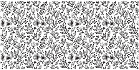 Intricate black and white botanical pattern with repeating floral motifs and leafy stems creating a dense textured background