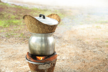 streamed cooked stove for making sticky rice on hot stove in