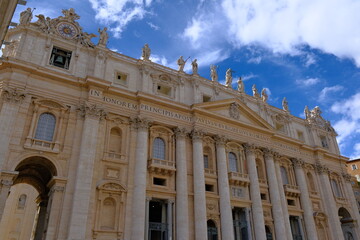 Low-angle view of the magnificent facade of St. Peter's Basilica in Vatican City
