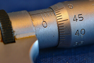 Macro View of Metric Micrometer Barrel with Graduated Increments