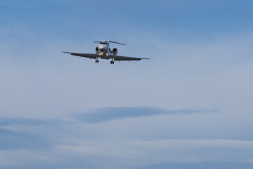 Corporate aircraft approaching the airport