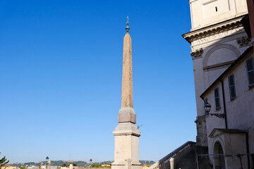 obelisk at Trinità dei Monti in Rome against clear blue sky