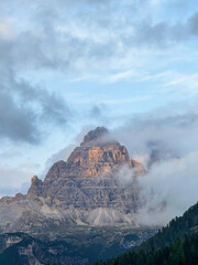 Aerial view of breathtaking landscape of Lake Misurina and hotel. Dolomites mountain in background, IAlpine lake in the Italian Alps. Drone view of Lago di Misurina. Mountain forest lake with a view.