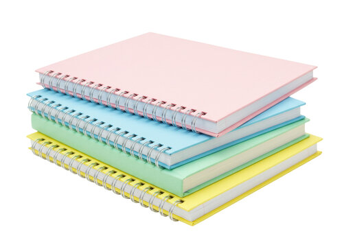 Isolated Stack of colorful pastel spiral notebooks. Back to school stationery supplies