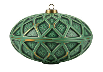 Isolated green ceramic holiday ornament with intricate geometric pattern, golden details