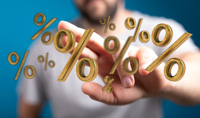 Close-up of a hand reaching towards golden percentage symbols, perfect for finance, investment, or...