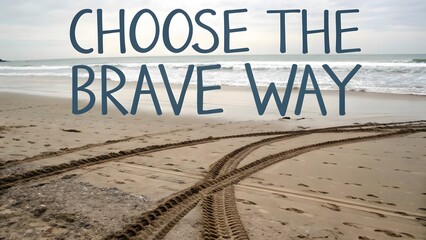 Intersecting tire tracks on a beach with inspirational words