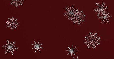 Stunning abstract background featuring silver snowflakes on a rich, deep red backdrop perfect for winter, Christmas, and holiday designs.