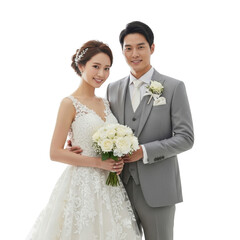 Happy couple in wedding attire embracing and smiling ready for marriage.