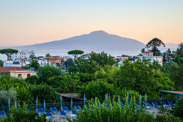 Pre-dawn view from a Sorrento rooftop, with the Bay of Naples and Mount Vesuvius bathed in the soft glow of the approaching sunrise - 2