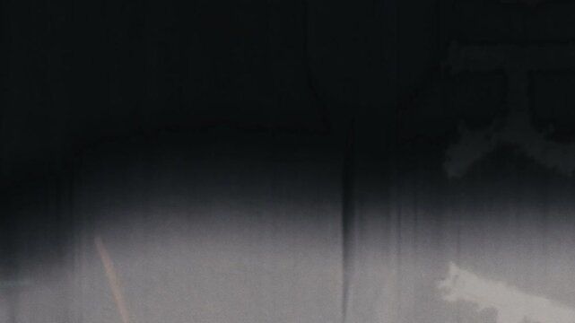 Grungy, vintage microfiche-style transitions for dynamic video edits. Ideal for historical or technological themes