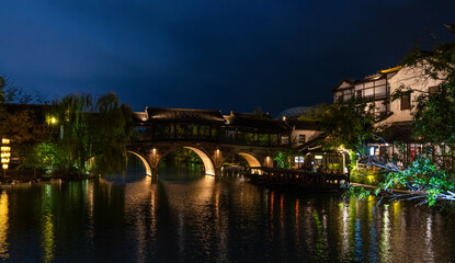 Obraz premium The ancient water village of Puyuan, an old town on the water village for over 1000 years, is located in Wuxi, China.