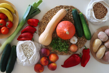 Collection of healthy fruits, vegetables and legumes on white background. Top view.