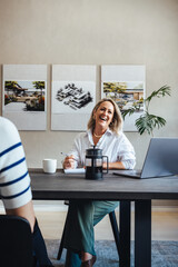 Professional team discussing architectural projects in a modern office setting