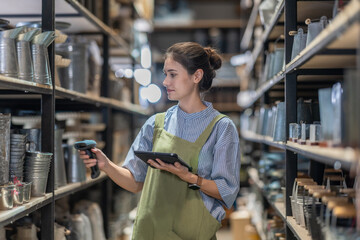 A Female Entrepreneur in a Family Run Ceramic Business Checking Stock