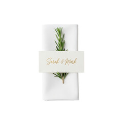 Elegant wedding table place setting with a rosemary sprig and name card.