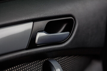 Obraz premium Modern Car Interior: close-up of details, steering wheel, dashboard, control buttons, leather cabin.