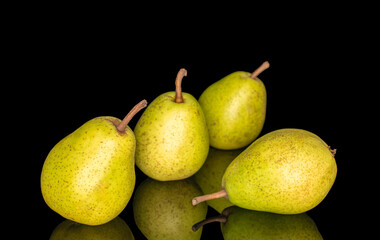 fresh pears isolated on black glass