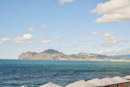 Seascape. View of the Karadag volcano from the sea.
