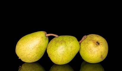 fresh pears isolated on black glass