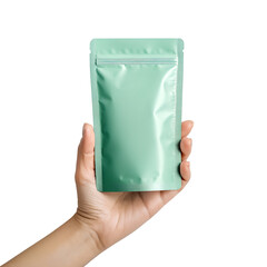 Hand holding a teal colored pouch isolated on white background
