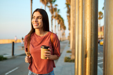 young woman girl travel tourist outdoor city happy vacation holiday street summer urban tourism traveler walking student visiting tour palm beach