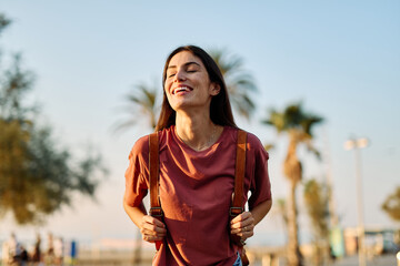 young woman girl travel tourist outdoor city happy vacation holiday street summer urban tourism...