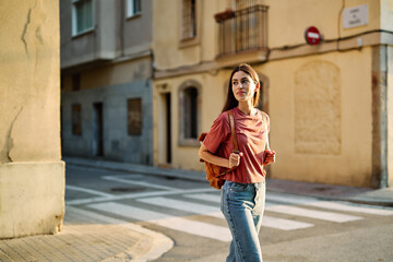 Fototapeta premium young woman girl travel tourist outdoor city happy vacation holiday street summer urban tourism traveler walking student visiting tour